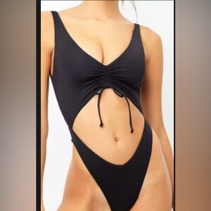 Frankie’s bikini sz medium. Monokini one piece w/cutouts. Adjustable coverage